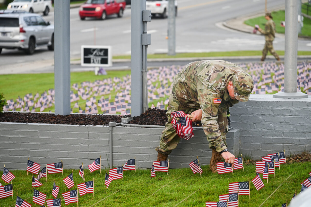 University of Tennessee at Chattanooga ROTC members place 2000 flags in front of Lane Funeral Home on Ashland Terrace, Wednesday, Sept. 7, 2022 in honor of 9/11.