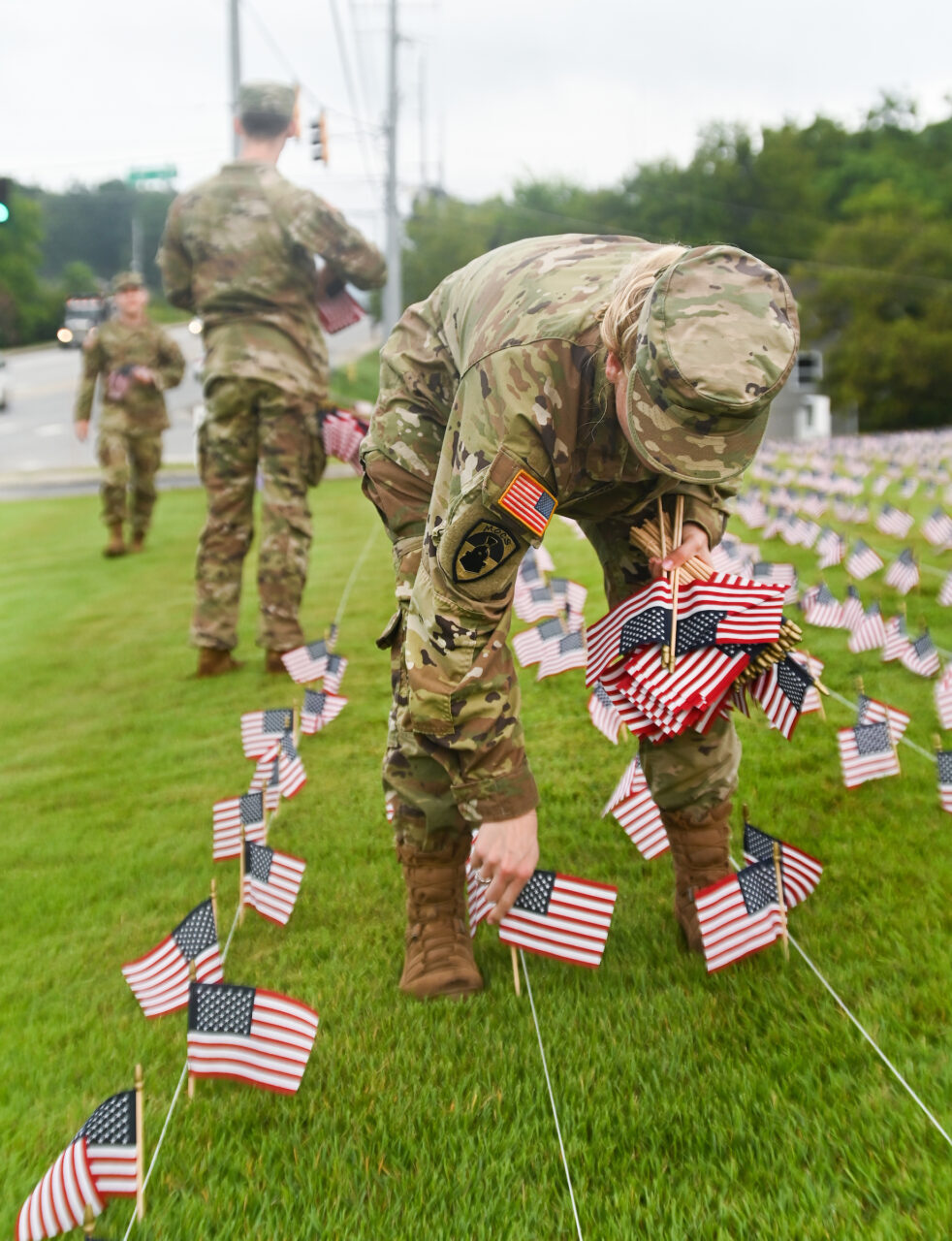 University of Tennessee at Chattanooga ROTC members place 2000 flags in front of Lane Funeral Home on Ashland Terrace, Wednesday, Sept. 7, 2022 in honor of 9/11.