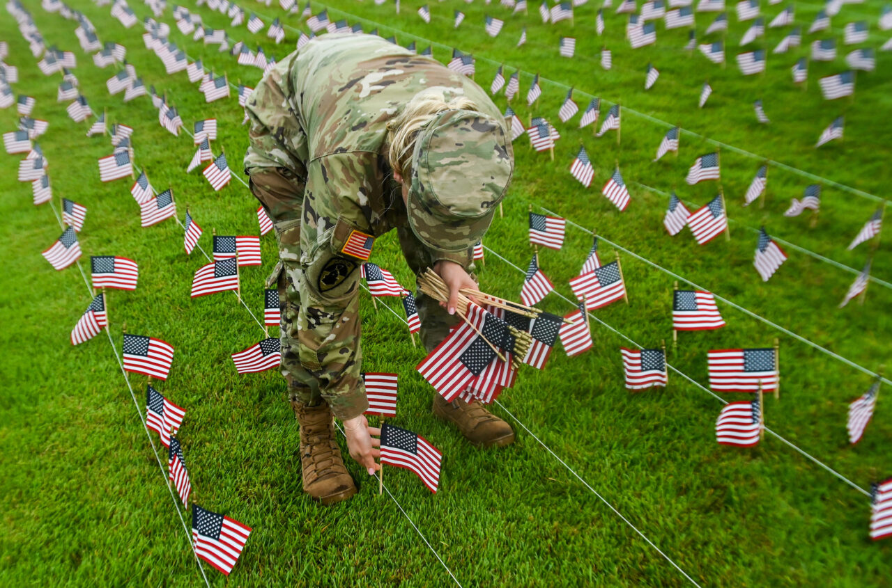 University of Tennessee at Chattanooga ROTC members place 2000 flags in front of Lane Funeral Home on Ashland Terrace, Wednesday, Sept. 7, 2022 in honor of 9/11.