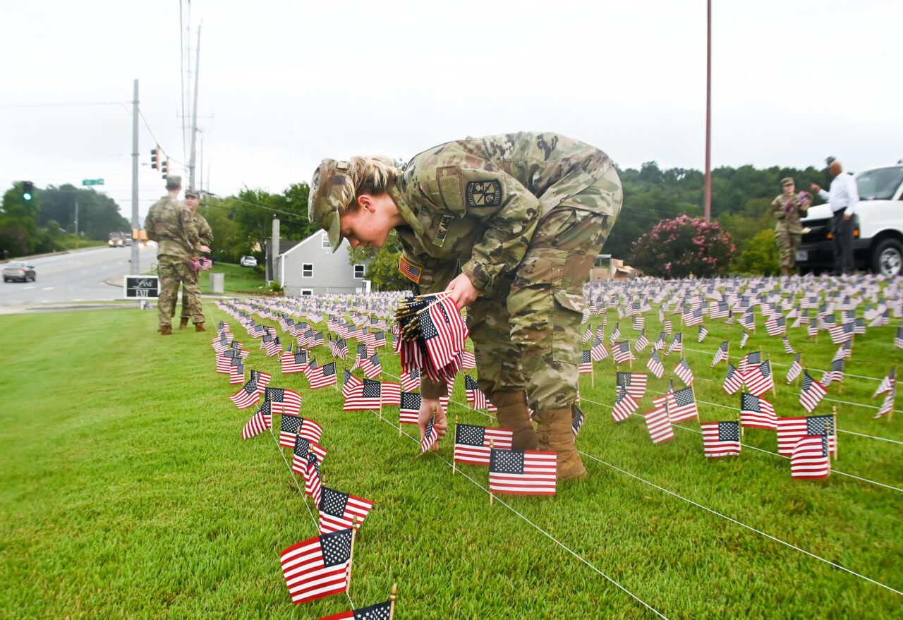 University of Tennessee at Chattanooga ROTC members place 2000 flags in front of Lane Funeral Home on Ashland Terrace, Wednesday, Sept. 7, 2022 in honor of 9/11.