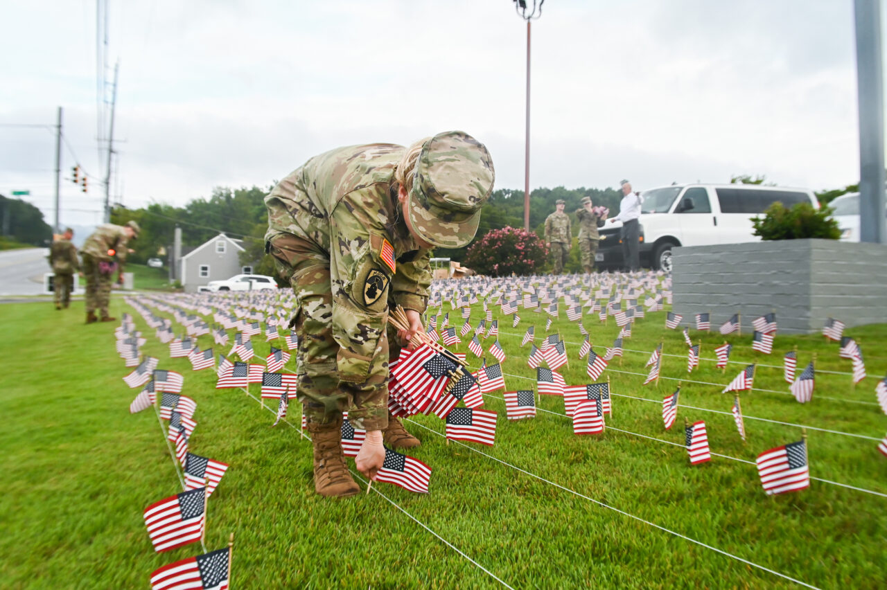 University of Tennessee at Chattanooga ROTC members place 2000 flags in front of Lane Funeral Home on Ashland Terrace, Wednesday, Sept. 7, 2022 in honor of 9/11.
