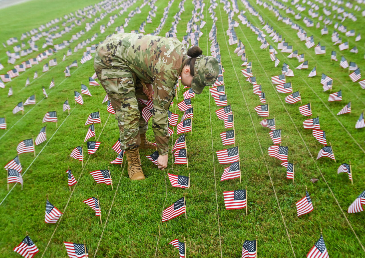 University of Tennessee at Chattanooga ROTC members place 2000 flags in front of Lane Funeral Home on Ashland Terrace, Wednesday, Sept. 7, 2022 in honor of 9/11.