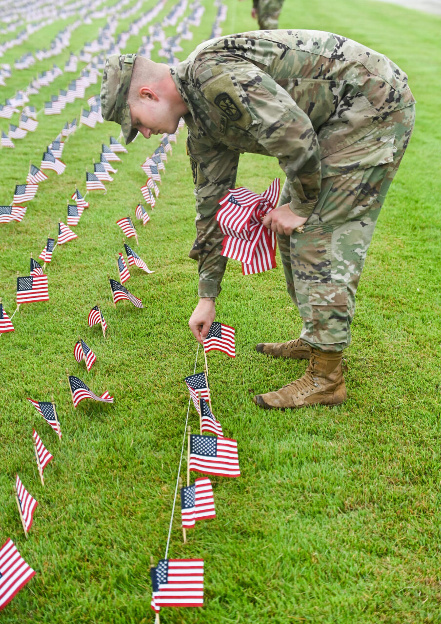 University of Tennessee at Chattanooga ROTC members place 2000 flags in front of Lane Funeral Home on Ashland Terrace, Wednesday, Sept. 7, 2022 in honor of 9/11.