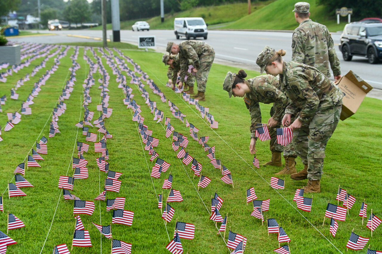 University of Tennessee at Chattanooga ROTC members place 2000 flags in front of Lane Funeral Home on Ashland Terrace, Wednesday, Sept. 7, 2022 in honor of 9/11.