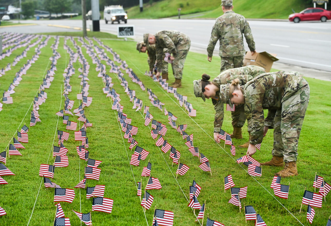 University of Tennessee at Chattanooga ROTC members place 2000 flags in front of Lane Funeral Home on Ashland Terrace, Wednesday, Sept. 7, 2022 in honor of 9/11.