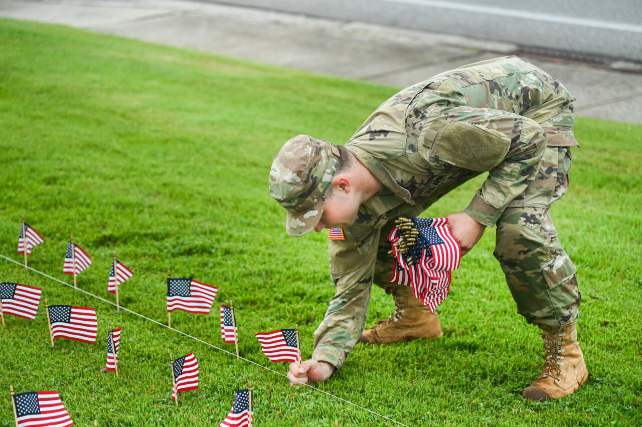 University of Tennessee at Chattanooga ROTC members place 2000 flags in front of Lane Funeral Home on Ashland Terrace, Wednesday, Sept. 7, 2022 in honor of 9/11.