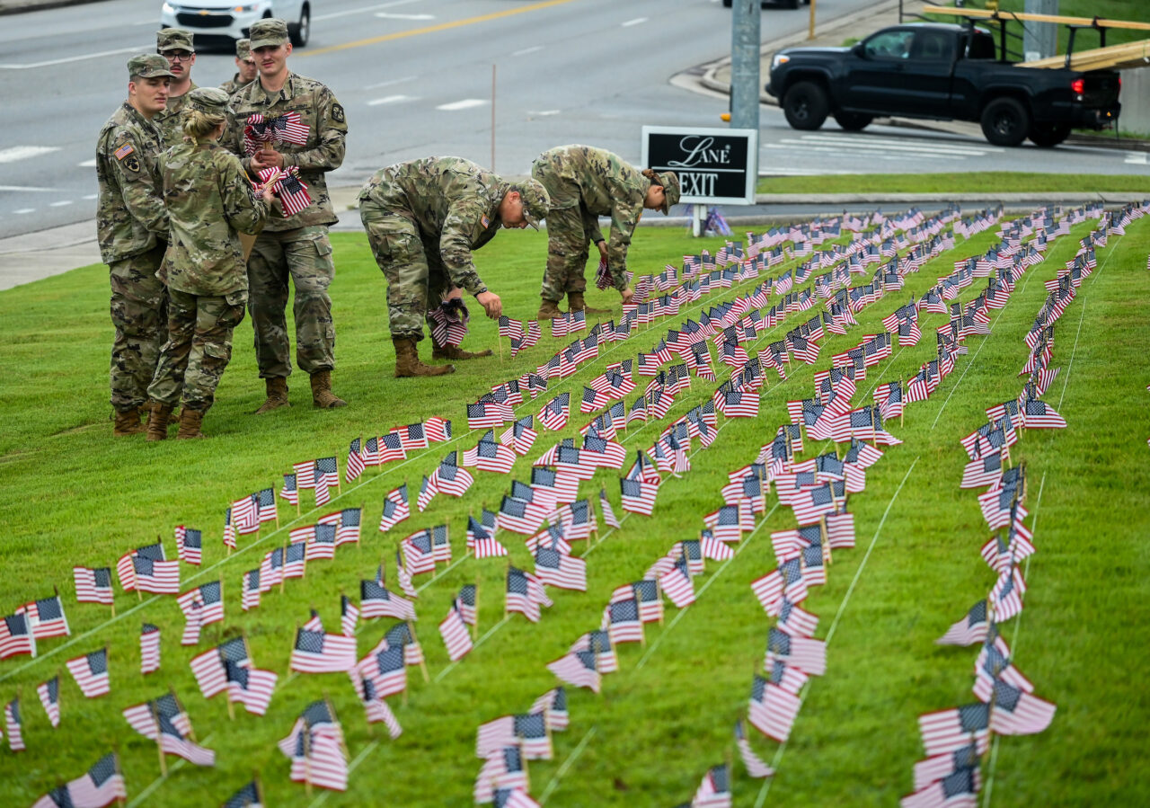 University of Tennessee at Chattanooga ROTC members place 2000 flags in front of Lane Funeral Home on Ashland Terrace, Wednesday, Sept. 7, 2022 in honor of 9/11.