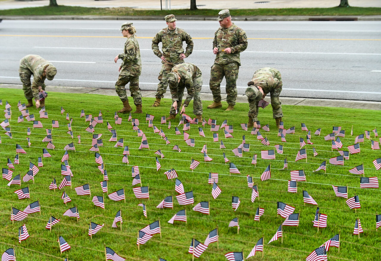 University of Tennessee at Chattanooga ROTC members place 2000 flags in front of Lane Funeral Home on Ashland Terrace, Wednesday, Sept. 7, 2022 in honor of 9/11.