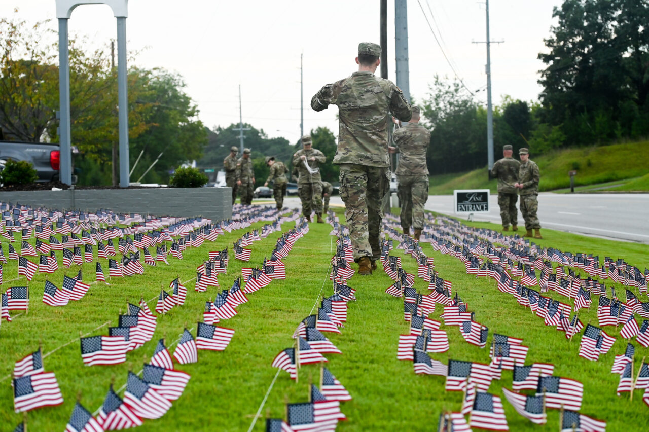 University of Tennessee at Chattanooga ROTC members place 2000 flags in front of Lane Funeral Home on Ashland Terrace, Wednesday, Sept. 7, 2022 in honor of 9/11.