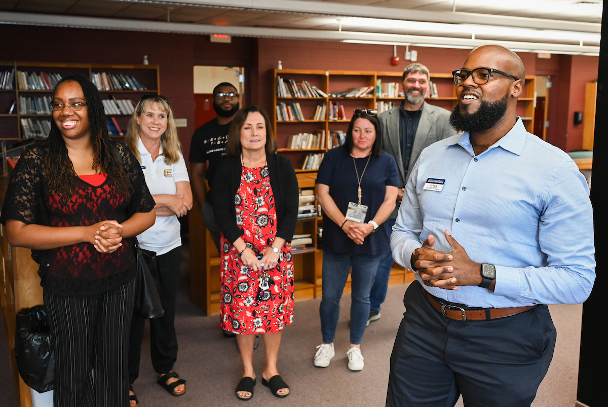 UTC's A.J. Davis speaks to Tyner Academy students.