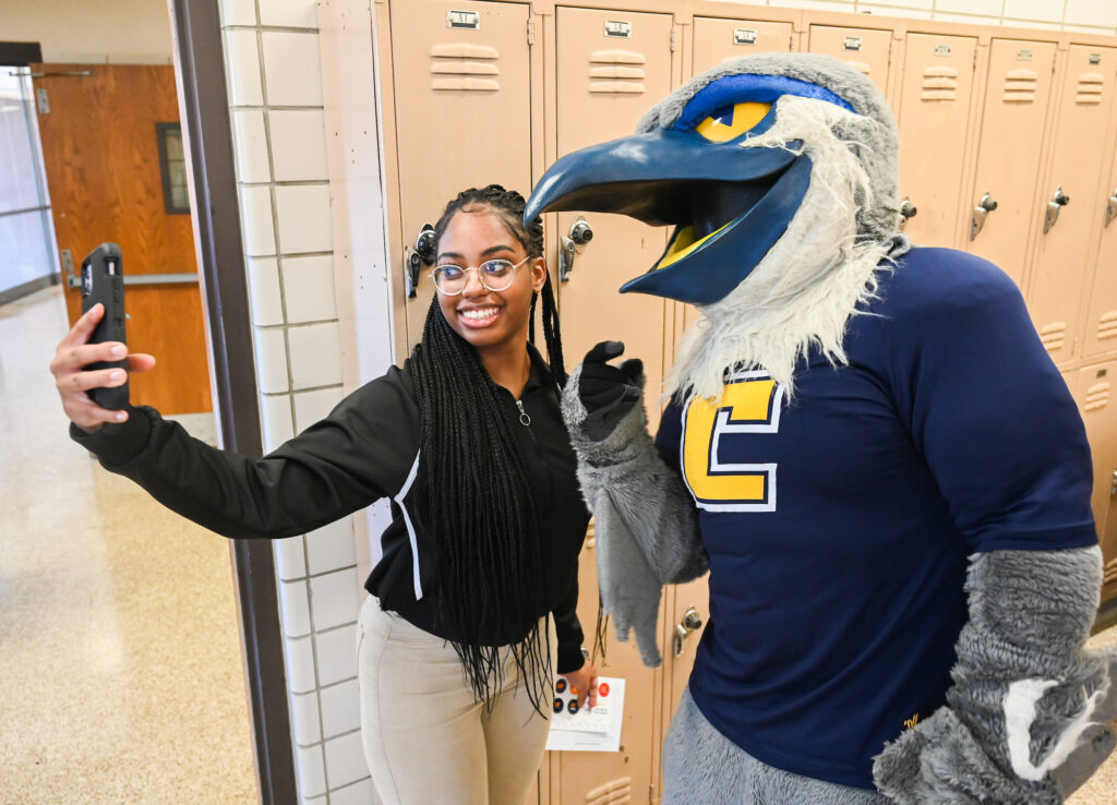 Scrappy took photos with Central High School students during the UT Promise visit.