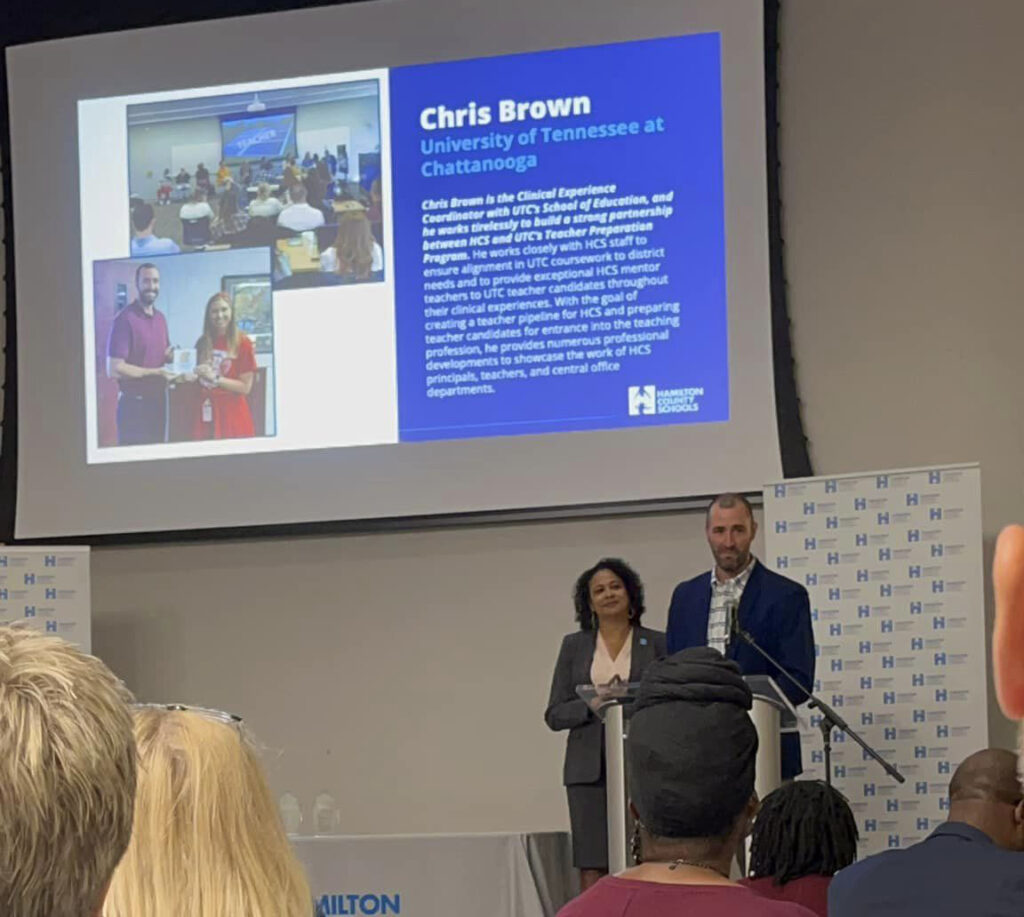 Chris Brown, right, received the Teacher Champion Award from Hamilton County Schools Deputy Superintendent Sonia Stewart. Photo credit: Dayton Brown.