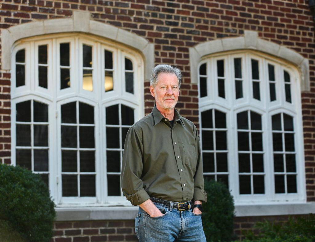 Dr. Greg O’Dea stands in the Shakespeare Garden on the UTC campus. O'Dea is the recipient of the National Collegiate Honors Council's 2022 Sam Schuman Award for Excellence at a Four-Year Institution—a prestigious award in the world of Honors colleges and programs. Photo by Angela Foster.