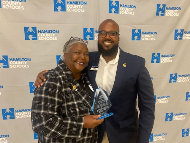 Twyler Boykin, left, was presented with the new UTC Diversity and Engagement Community Impact Award by A.J. Davis at the Hamilton County Schools Partners in Education Breakfast. Photo credit: Kristina McClure.