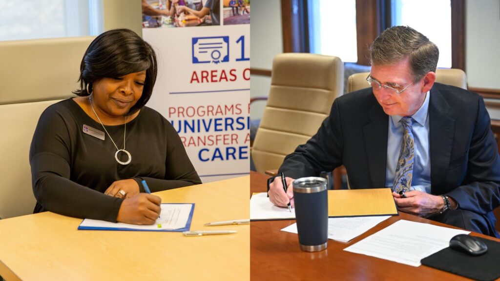 Volunteer State Community College President Orinthia Montague, left, signs the articulation agreement in Gallatin, Tennessee, while UTC Chancellor Steven R. Angle signs in Founders Hall.