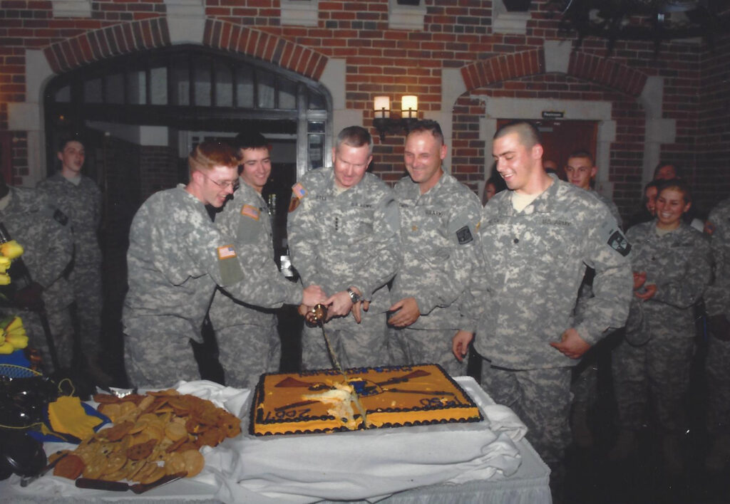 The UTC ROTC reactivation on Oct. 13, 2007, at Founders Hall included a ceremonial cake cutting. From left: cadet Jeremy Davis, cadet Scott Finks, Gen. B.B. Bell, Maj. Ben Smith, cadet Kevin Helton. All three of cadets graduated and commissioned as second lieutenants. Photo credit: Michelle Pelfrey.