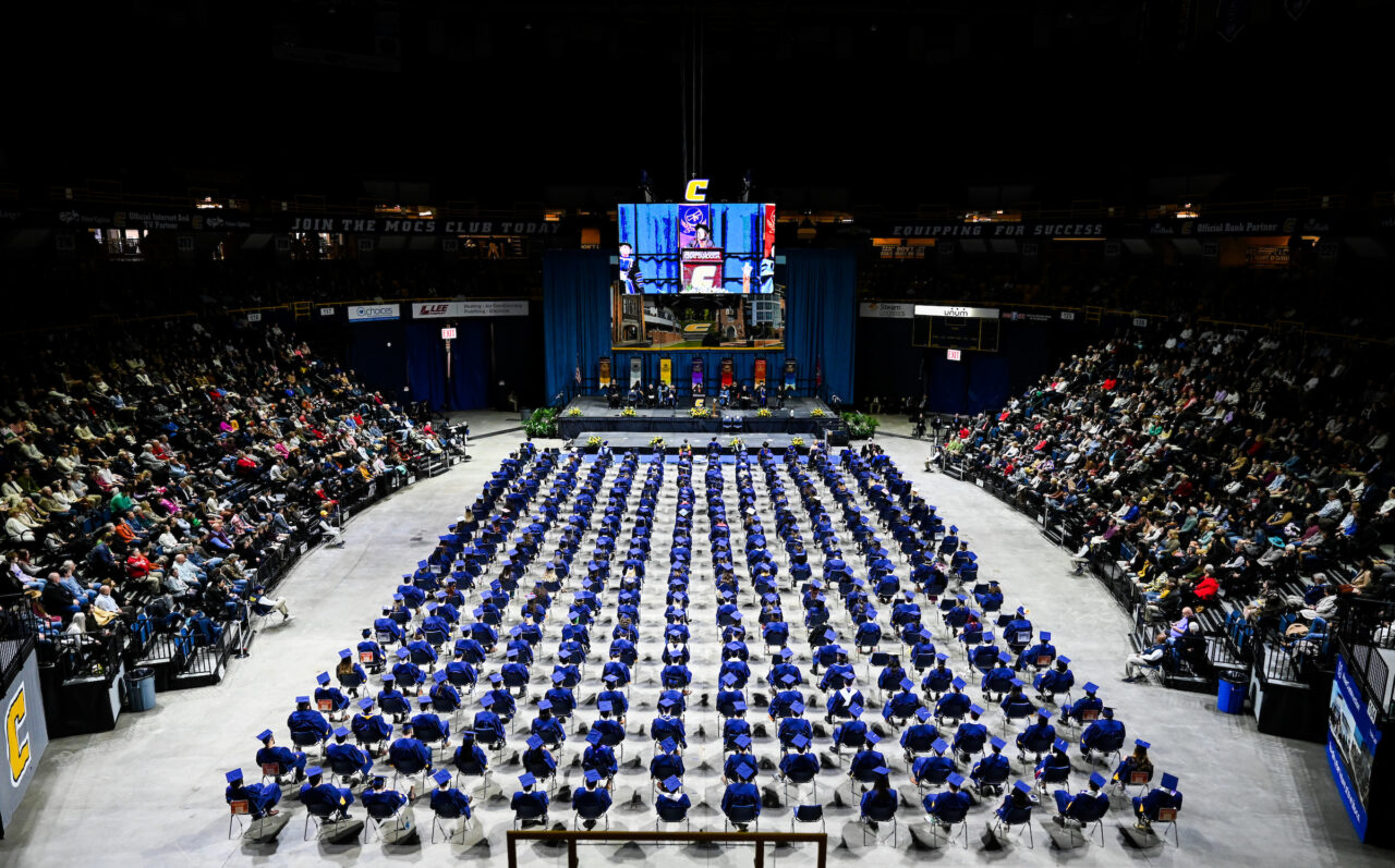 Students listen to speaker Michelle Deardorff during the first of two University of Tennessee at Chattanooga undergraduate commencement ceremonies on Saturday, Dec. 17, 2022 in McKenzie Arena.