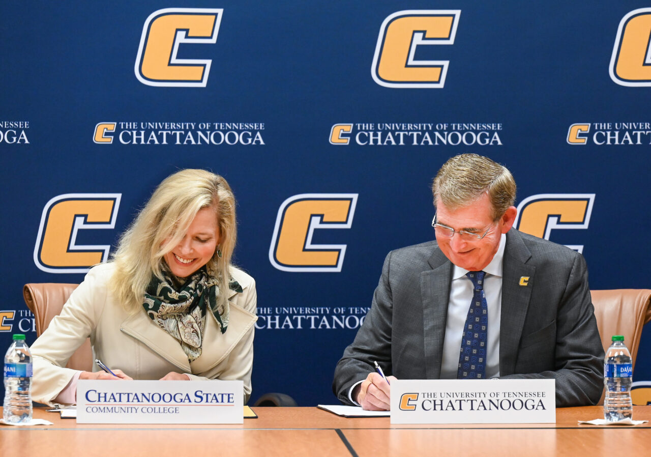 Chattanooga State Community College President Rebecca Ashford, left, and UTC Chancellor Steven R. Angle sign the Bachelor of Applied Science: Applied Leadership articulation agreement on Jan. 6, 2023. Photo by Angela Foster.