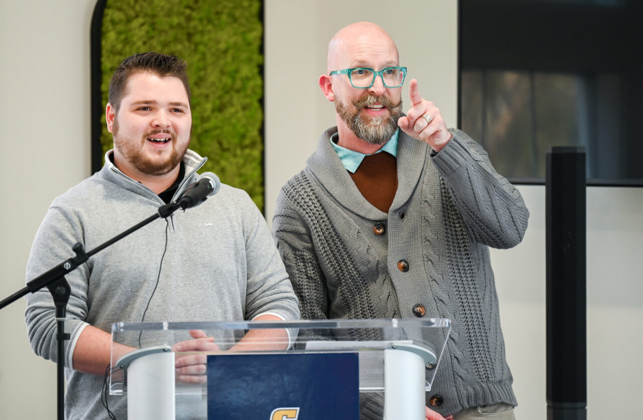Interior Architecture and Design students Jacob Ridenour, left, and J.T. Taylor at the grand opening of The Aviary at Stacy Town Center on, Monday, Jan. 9. Photo by Angela Foster.
