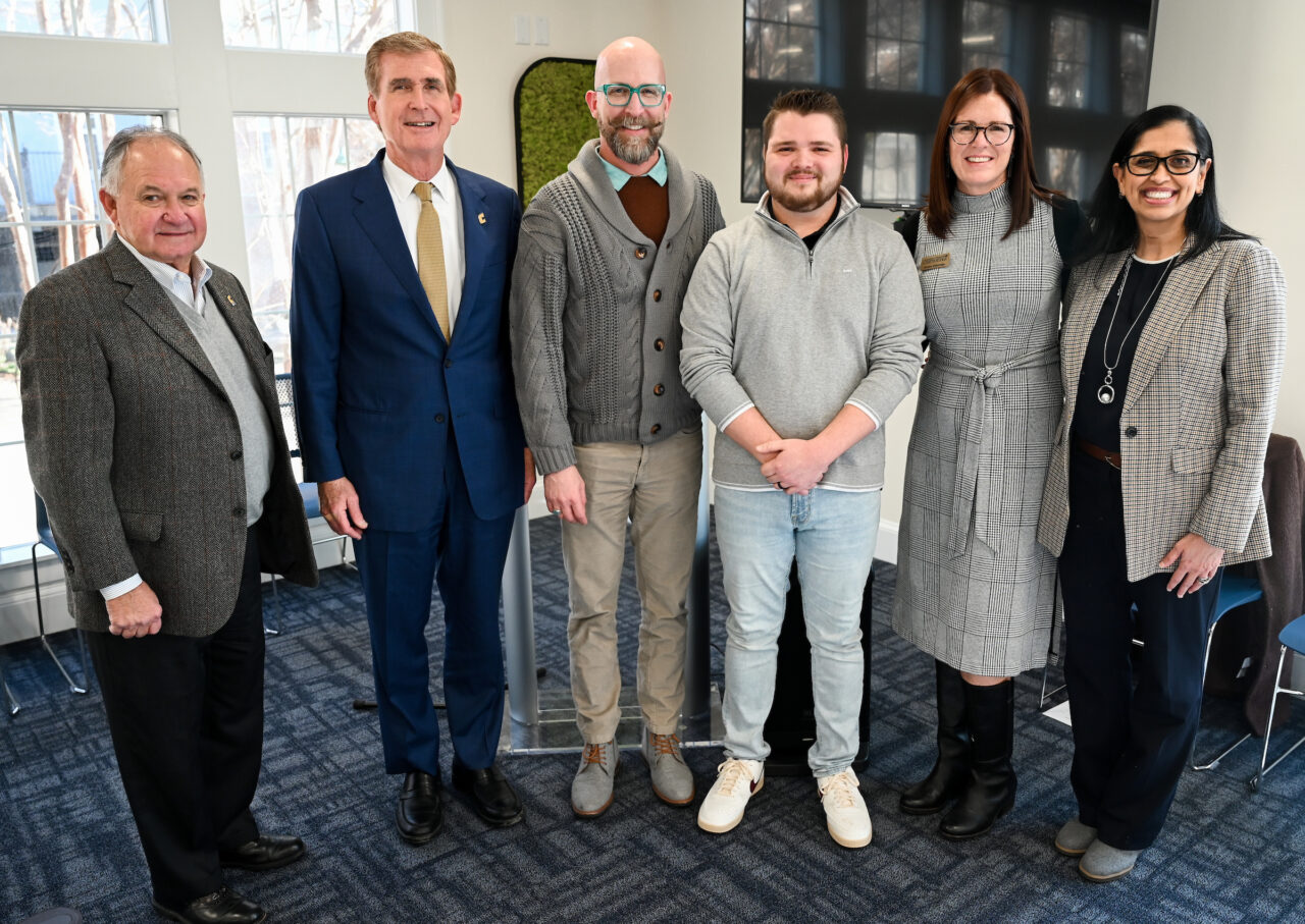 From left: UC Foundation board member and real estate chair Roger Smith; Chancellor Steven R. Angle; interior architecture and design students J.T. Taylor and Jacob Ridenour; Associate Professor Jessica Etheredge; Associate Vice Chancellor for Enrollment Management and Student Affairs Abeer Mustafa.