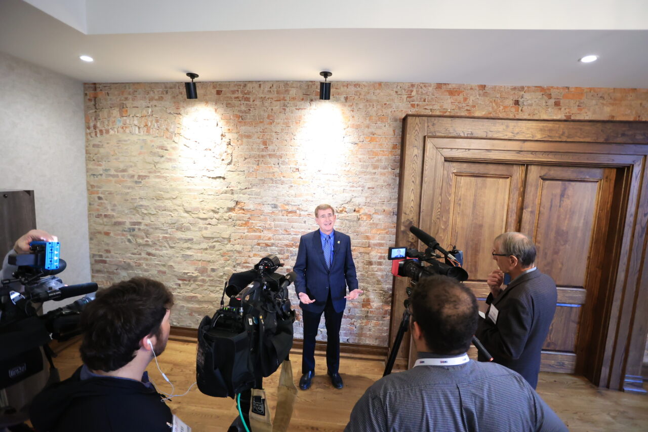 Chancellor Steven R. Angle talks to reporters as part of the "Gig City Goes Quantum" announcement.
