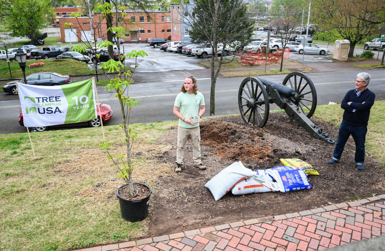 UTC Arbor Day celebration, Friday, March 31, 2023 in front of the Patten House. Hill Craddock, professor Students Nick Funk, green Zach Anderson, blue shirt Anesa Katana, dark shirt