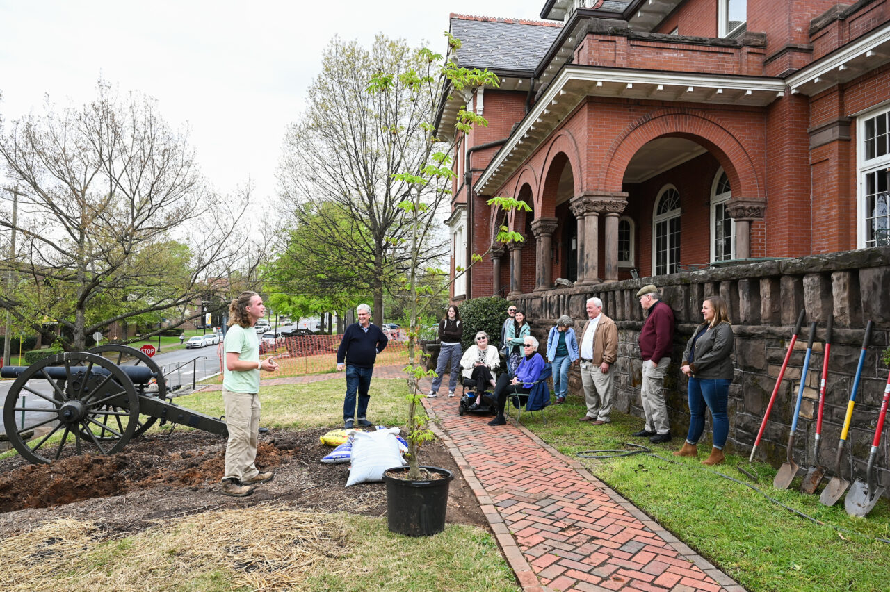UTC Arbor Day celebration, Friday, March 31, 2023 in front of the Patten House. Hill Craddock, professor Students Nick Funk, green Zach Anderson, blue shirt Anesa Katana, dark shirt