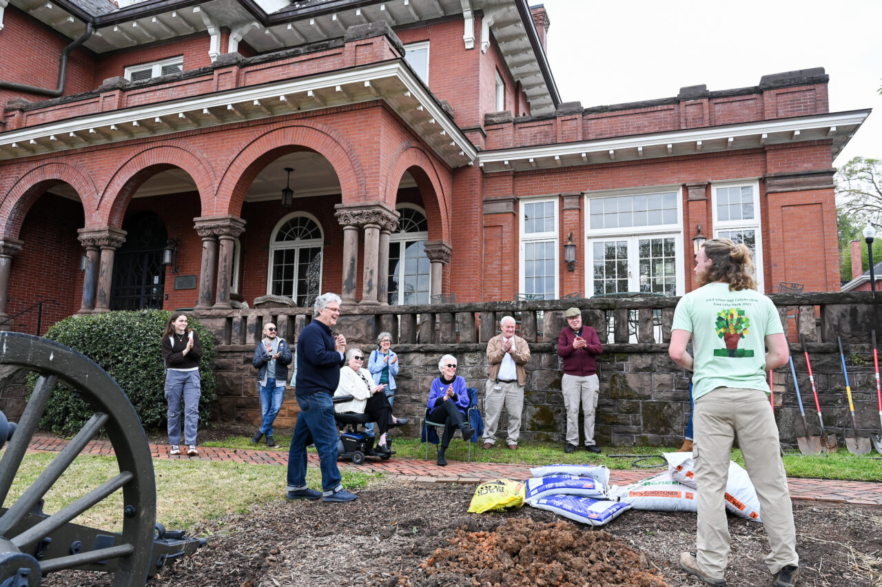 UTC Arbor Day celebration, Friday, March 31, 2023 in front of the Patten House. Hill Craddock, professor Students Nick Funk, green Zach Anderson, blue shirt Anesa Katana, dark shirt