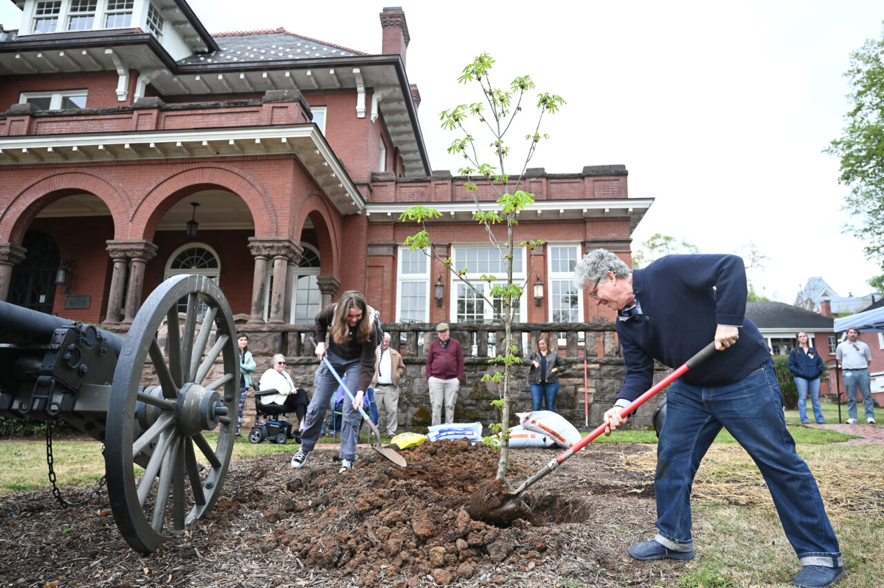 UTC Arbor Day celebration, Friday, March 31, 2023 in front of the Patten House. Hill Craddock, professor Students Nick Funk, green Zach Anderson, blue shirt Anesa Katana, dark shirt