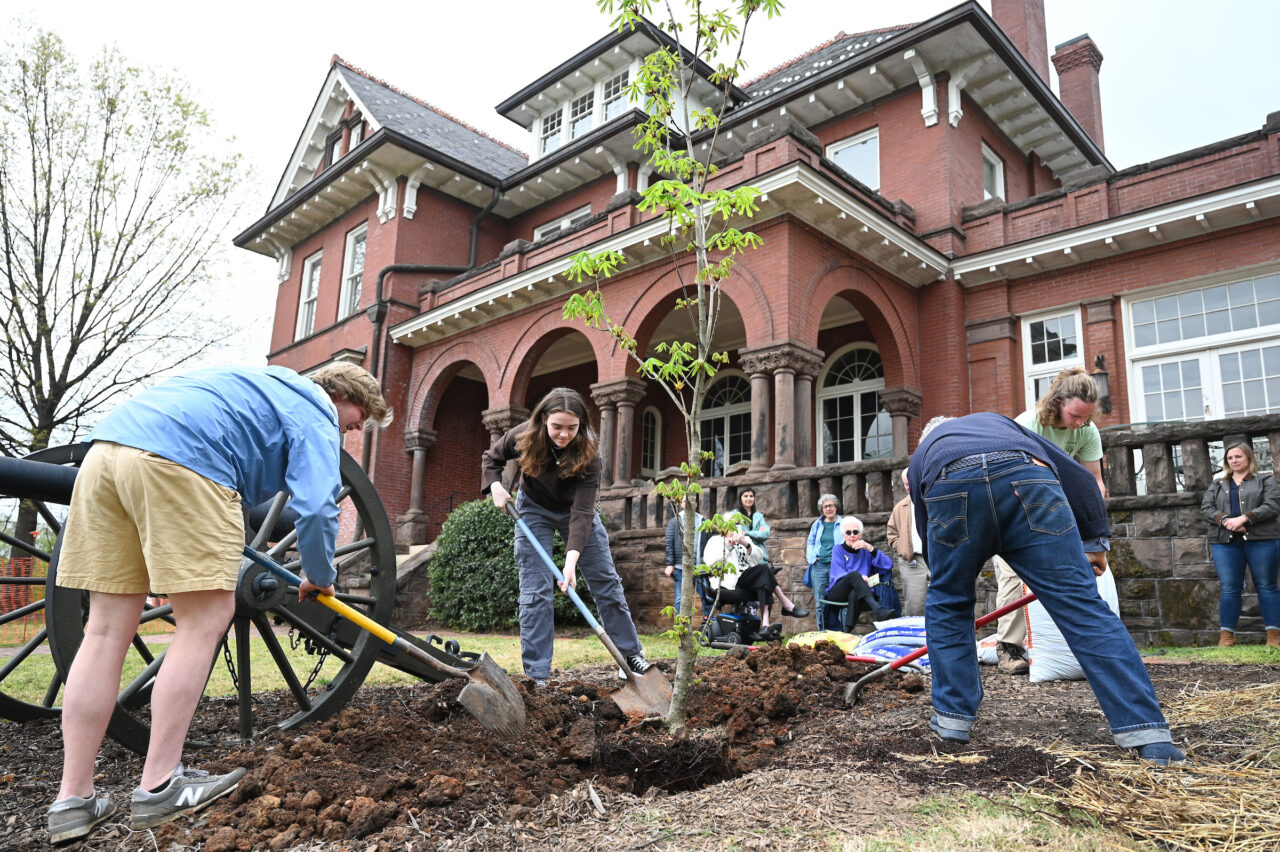 UTC Arbor Day celebration, Friday, March 31, 2023 in front of the Patten House. Hill Craddock, professor Students Nick Funk, green Zach Anderson, blue shirt Anesa Katana, dark shirt