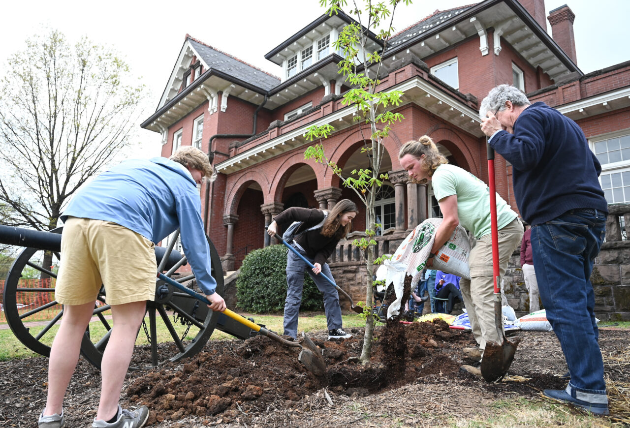 UTC Arbor Day celebration, Friday, March 31, 2023 in front of the Patten House. Hill Craddock, professor Students Nick Funk, green Zach Anderson, blue shirt Anesa Katana, dark shirt