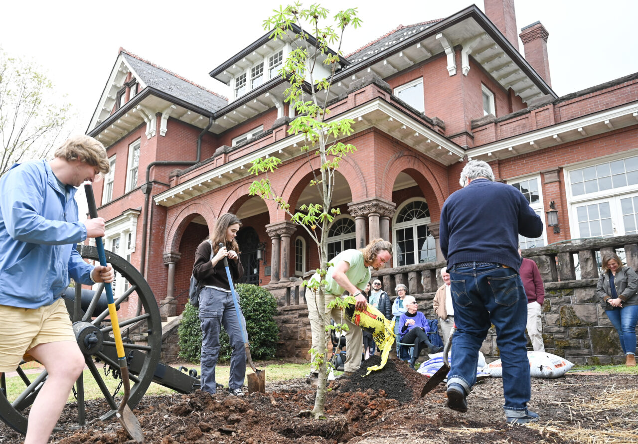 UTC Arbor Day celebration, Friday, March 31, 2023 in front of the Patten House. Hill Craddock, professor Students Nick Funk, green Zach Anderson, blue shirt Anesa Katana, dark shirt