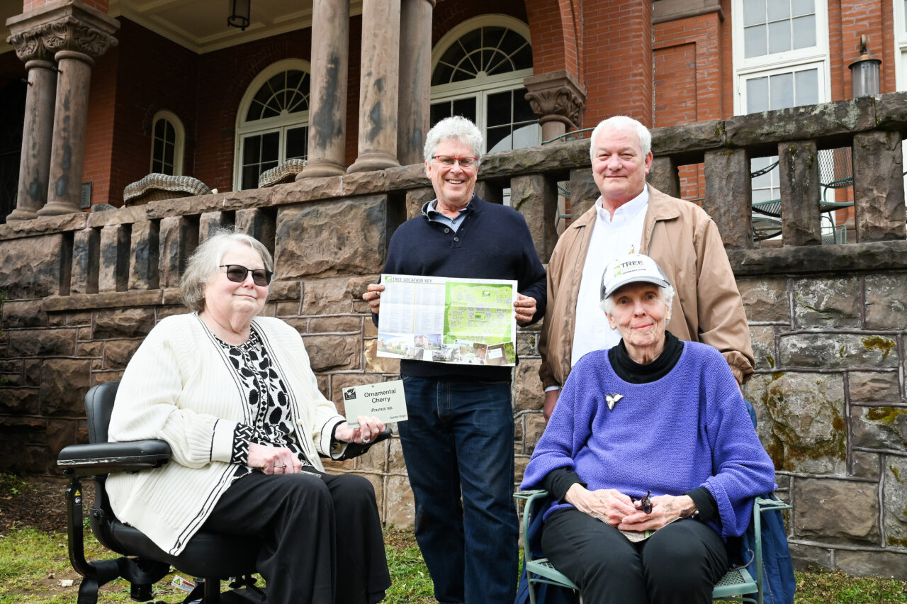 UTC Arbor Day celebration, Friday, March 31, 2023 in front of the Patten House. Hill Craddock, professor Students Nick Funk, green Zach Anderson, blue shirt Anesa Katana, dark shirt