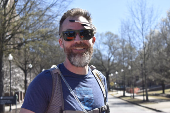 Runner Ben Warner sports the EEG headset. Photo by Shelby Rector.