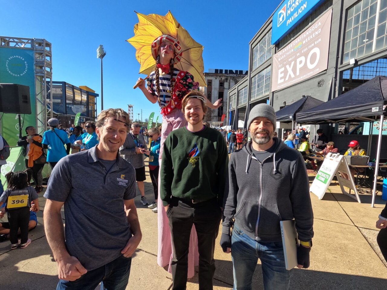 Researchers and web developers (from left) Drew Bailey, Paul Muren and Alex Cruikshank at the Erlanger Chattanooga Marathon Expo on March 4 at the Tennessee Pavilion. Photo by Sam Lennon.