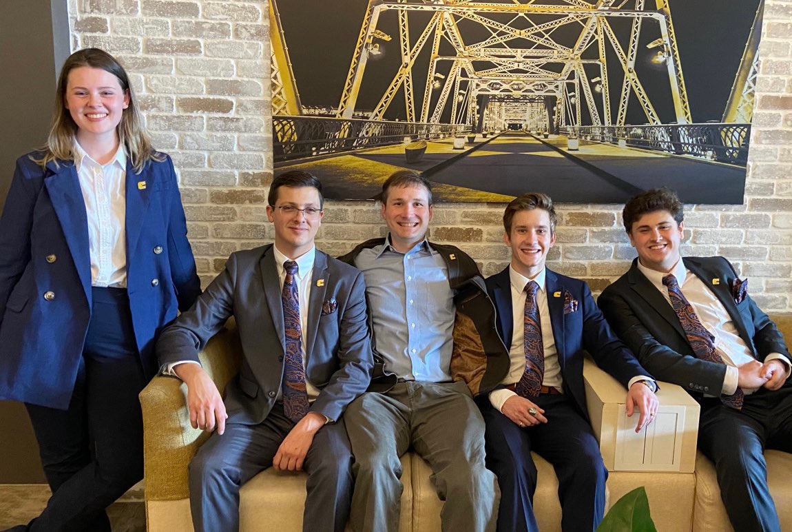 The 2023 SMILE Fund Chartered Financial Analyst Institute Research Challenge participants, from left: Claire Hoeke, Jacob Barber, faculty advisor Hunter Holzhauer, Grant Fetters and Nick Morris (photo courtesy of Hunter Holzhauer).
