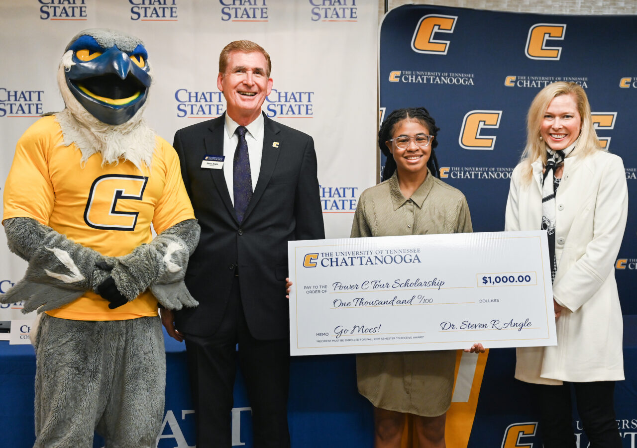 Chattanooga State student Devyn Johnson, who will be heading to UTC in the fall, was presented a $1,000 Power C Scholarship by Scrappy, Chancellor Steven R. Angle and Chattanooga State President Rebecca Ashford.