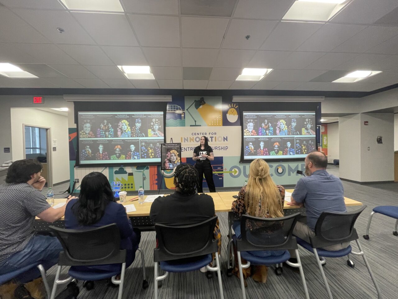 Senior Sami Belcher makes her pitch during the UTC Student Fly! Pitch competition.