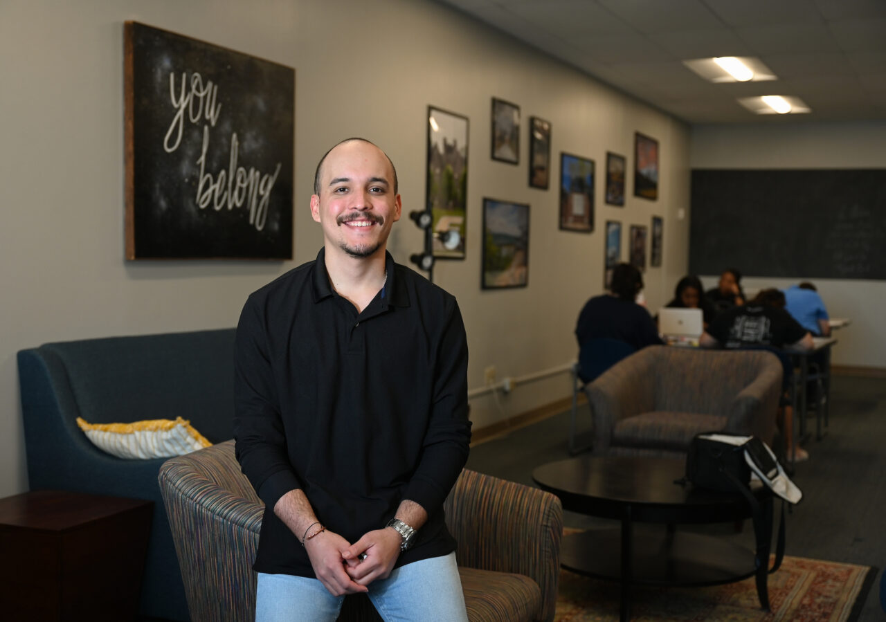 Juan Carlos Aponte Ortiz, shown in the Student Success Center, will be receiving a bachelor's degree in political science during May commencement ceremonies. Photo by Angela Foster.