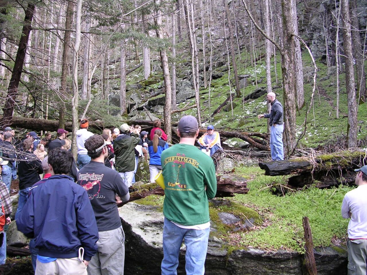 UC Foundation Professor Joey Shaw, director of the Spring Wildflower Pilgrimage, leads a wildflower trip into the Cove Hardwood Forest—which often contains as many as 30-50 species of wildflowers integrated on the forest floor.