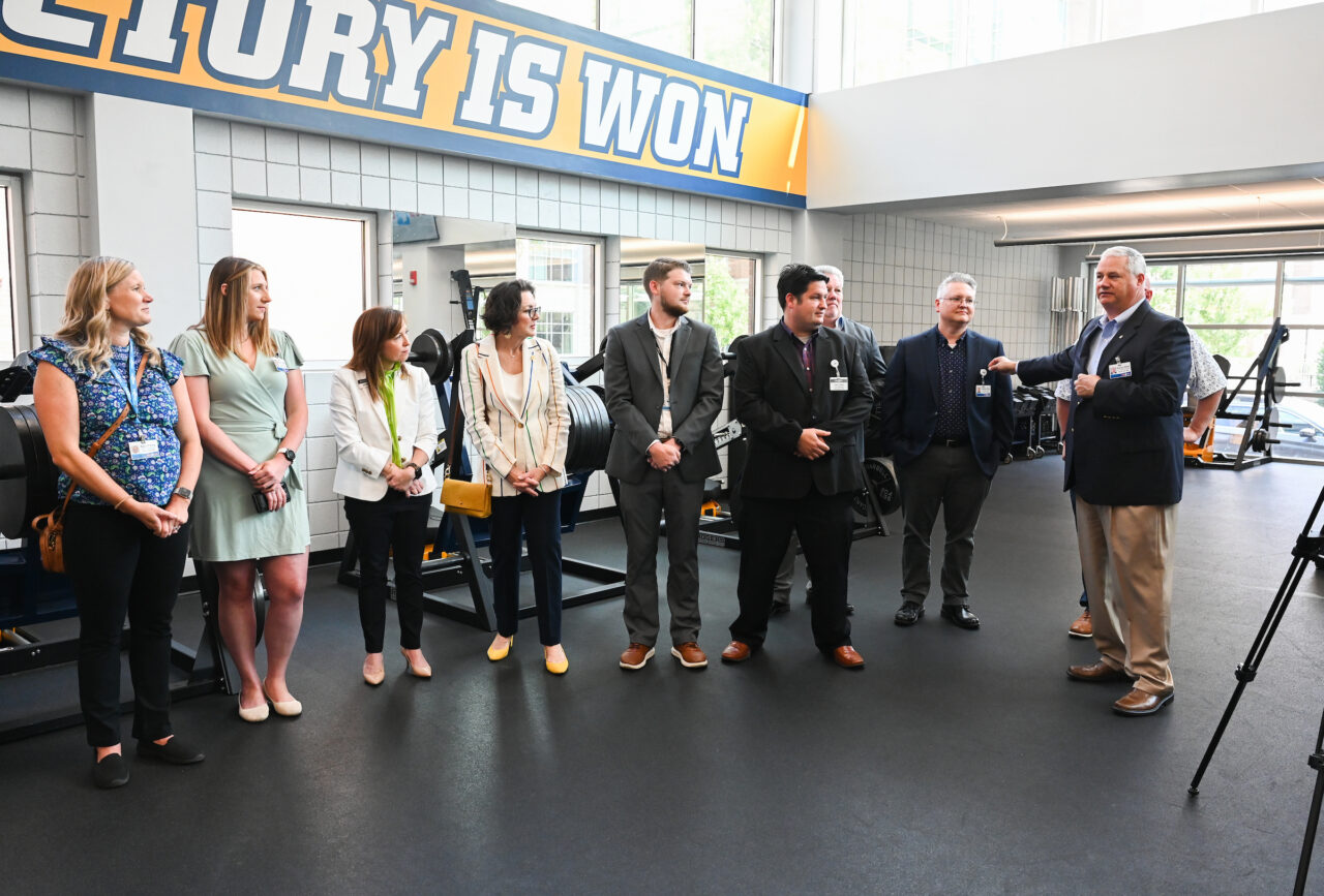 Food City and UTC representatives attend an event Thursday, May 25 in the Brenda Lawson Student-Athlete Success Center to announce that Food City will be funding a Fueling Station featuring healthy food options for athletes.