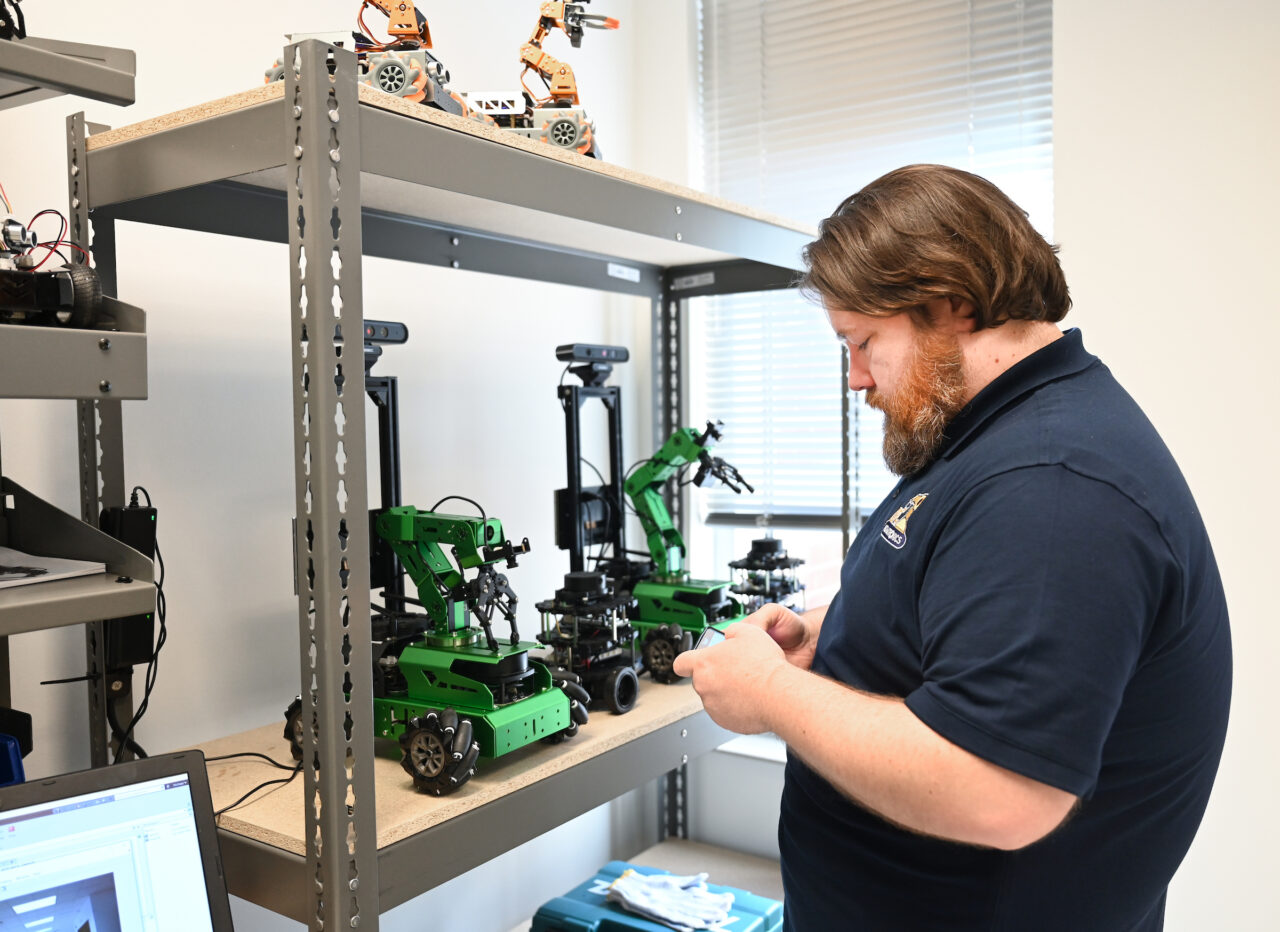 People attend the opening of the second mechatronics laboratory—the Robotics, Intelligent Systems and Control Lab, Thursday, May 4, 2023 in Engineering and Computer Science building.