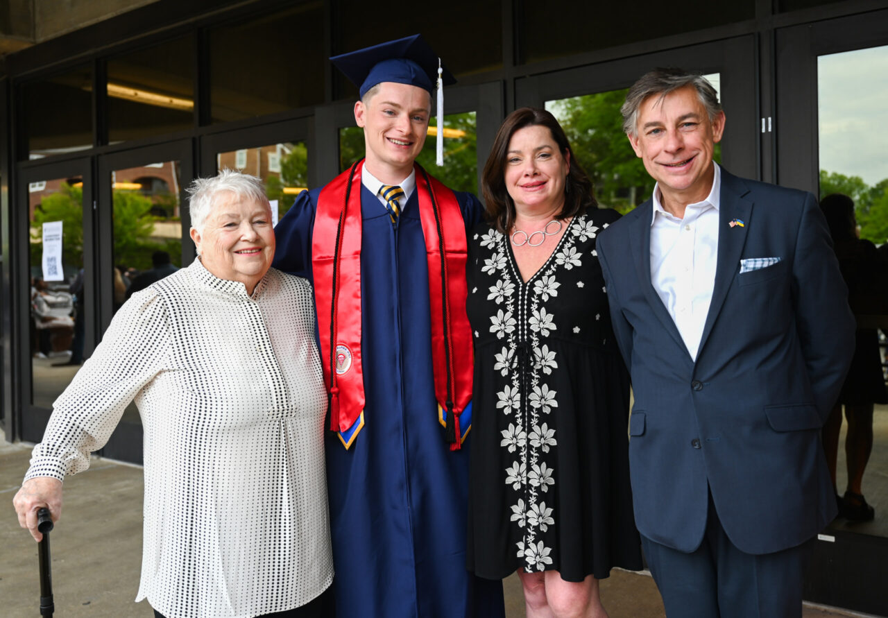 Three generations of the Schenk family have graduated from UTC (from left): Mary Ann (1996), Dru (2023), Denise (1995) and John (1995). Photo by Angela Foster.