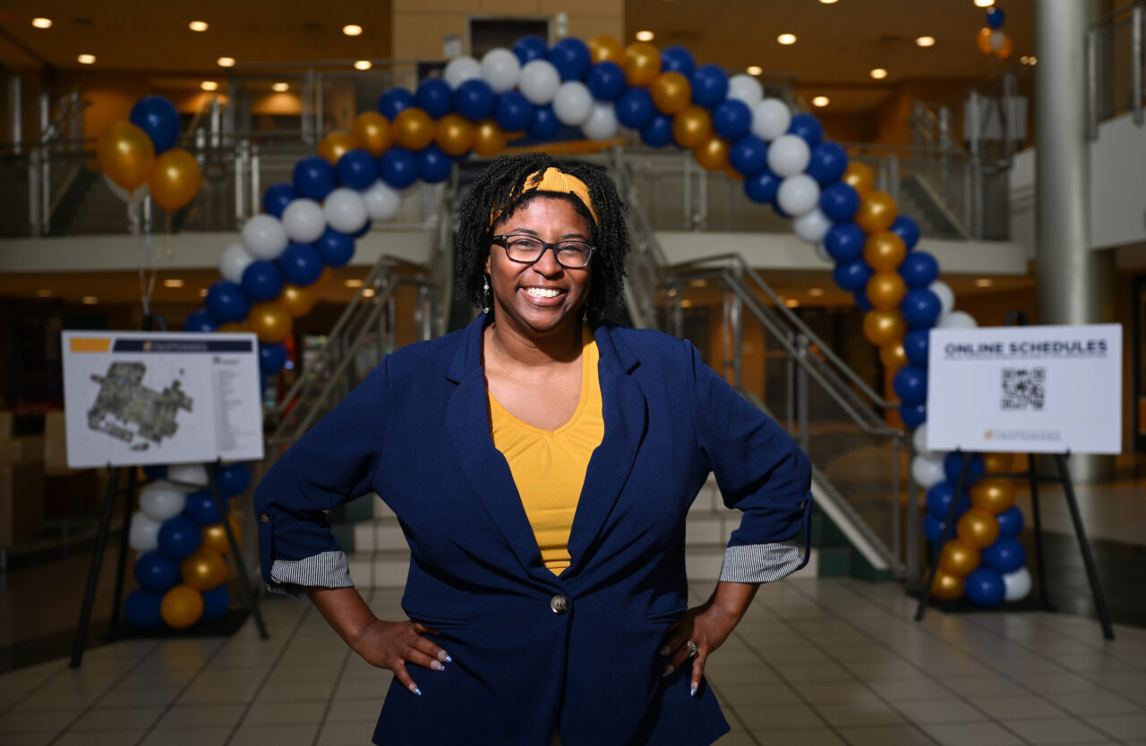 Brandalyn Shropshire stands in the University Center near the orientation information area. Photo by Angela Foster.