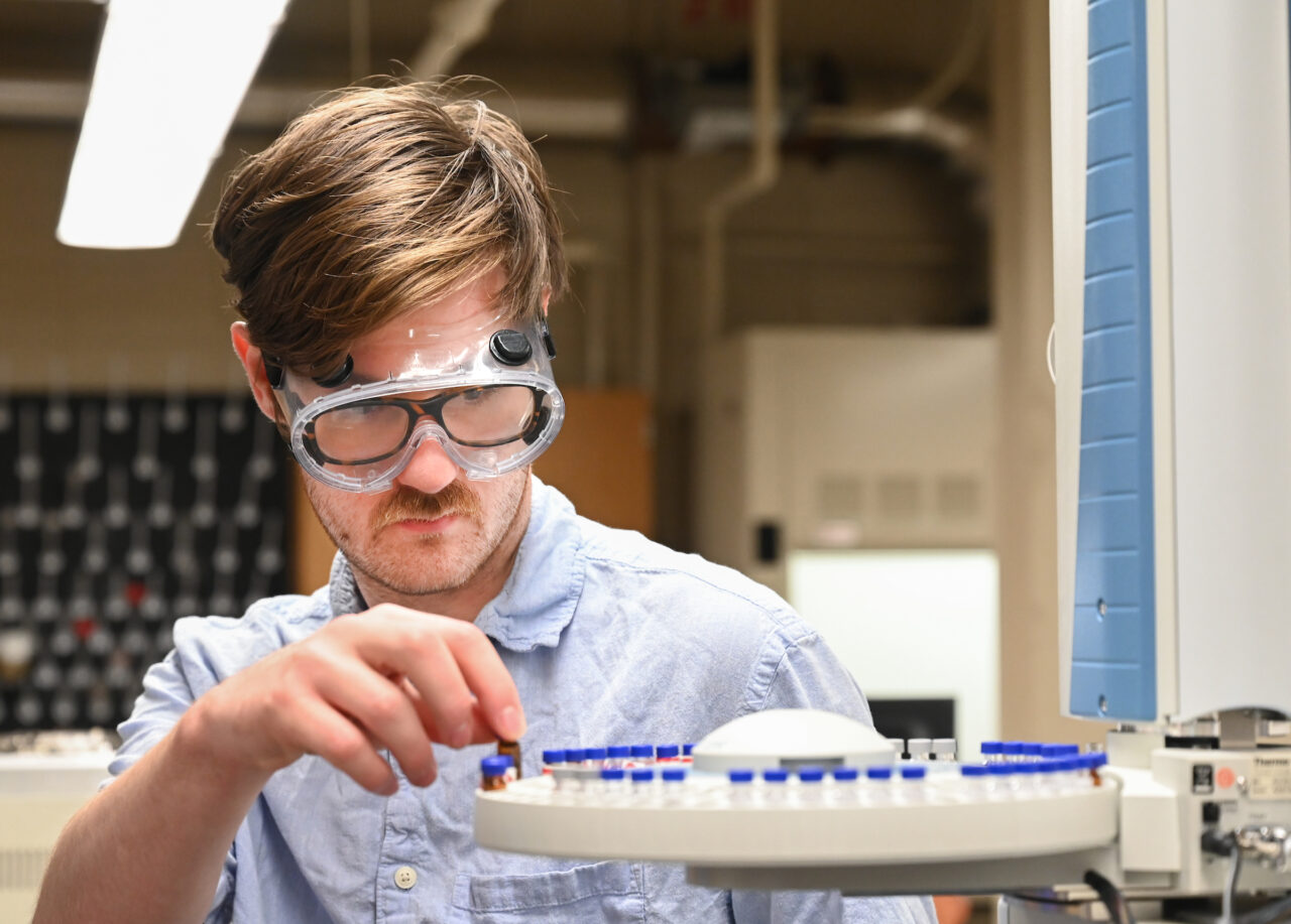 Baker Garrison, who plans to graduate from UTC in May 2024 with a bachelor’s degree in chemistry, conducts blood sample research. Garrison is part of a faculty and student team testing whether blood samples can be used to screen for endometrial cancer. Photo by Angela Foster.