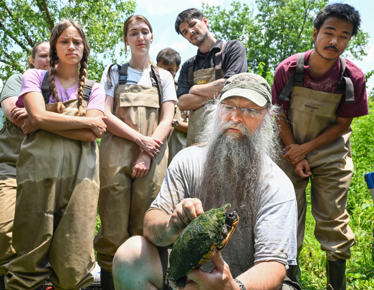 Thomas Wilson’s Environmental Survey Methods class studies turtle research methods Thursday, June 8, 2023 on the Tennessee River.