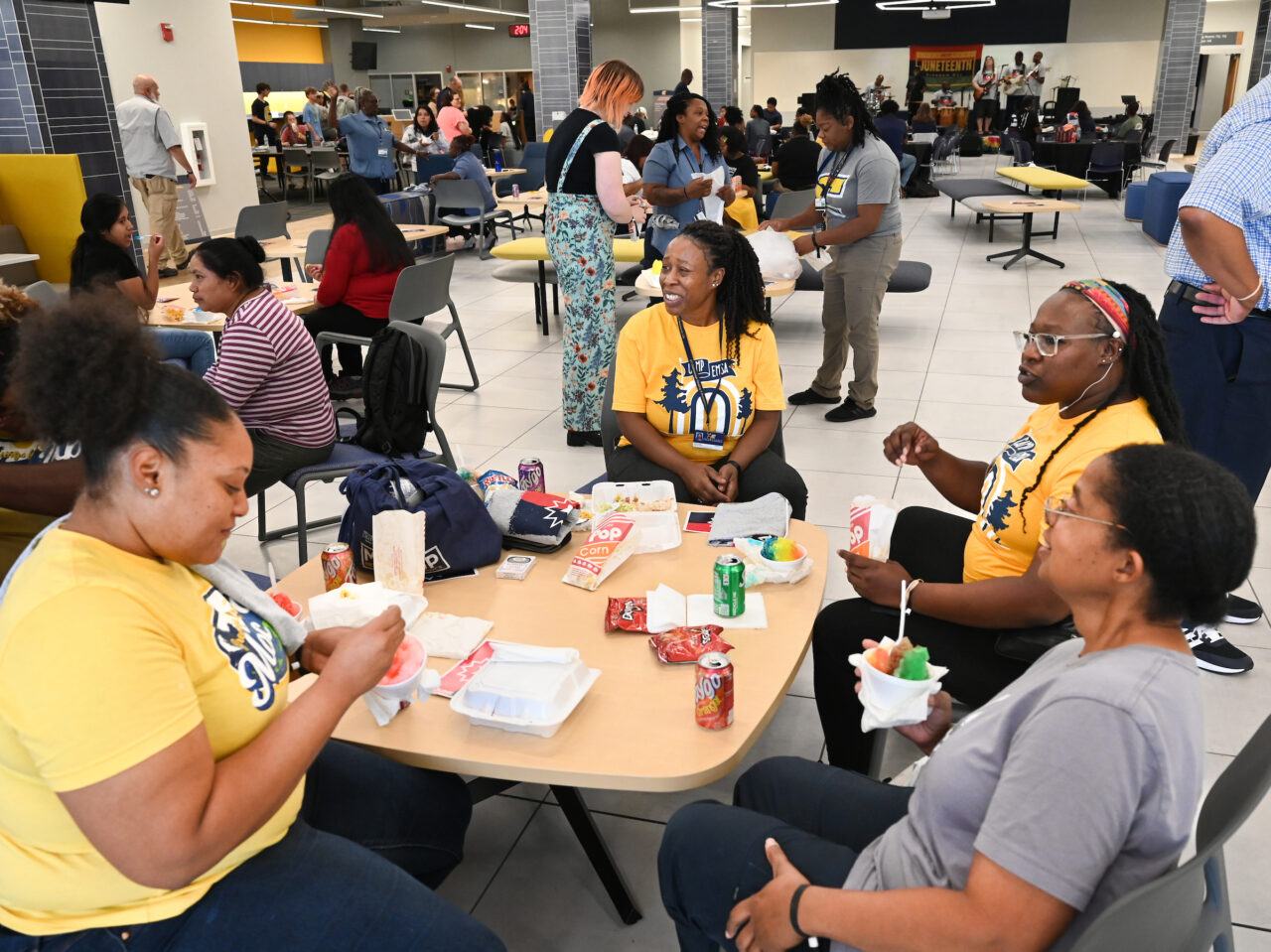 People attend a Junteenth celebration, Friday, June 16, 2023 in Lupton Hall.