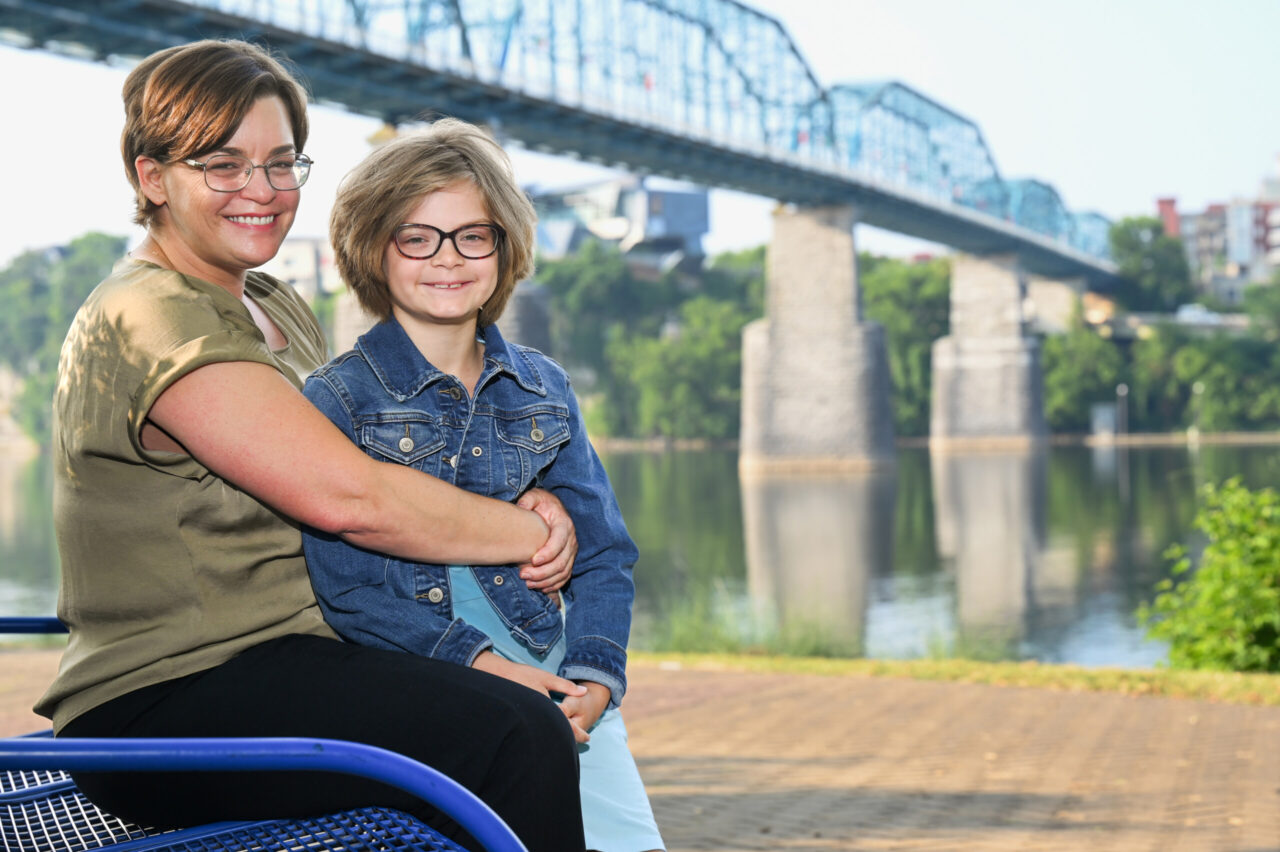 Katie Streber and her daughter, Joy, sit Friday, June 9, 2023, in Coolidge Park. Photo by Angela Foster.