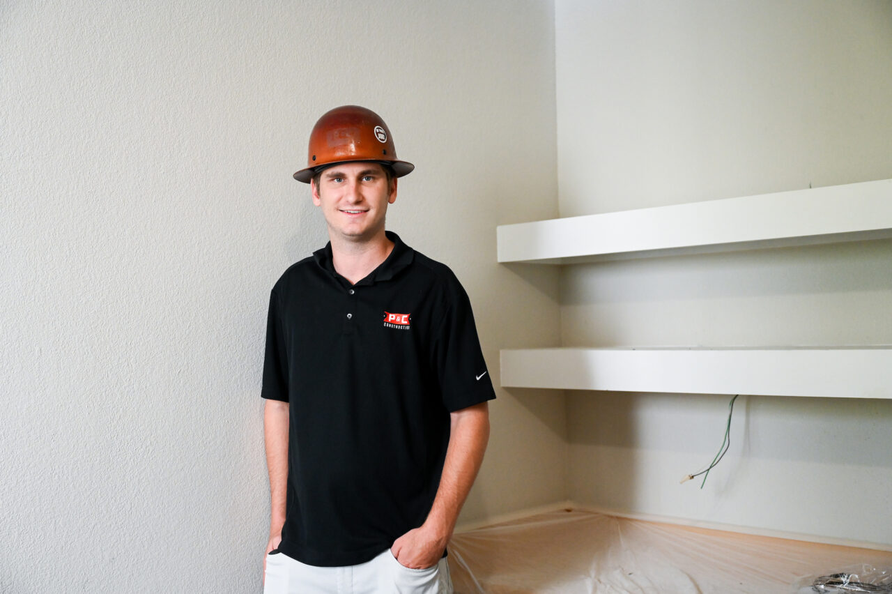 2019 UTC graduate Slade McGuire, who lived in the Walker Apartments as a freshman, is the site superintendent of the building's summer renovations. Photo by Angela Foster.