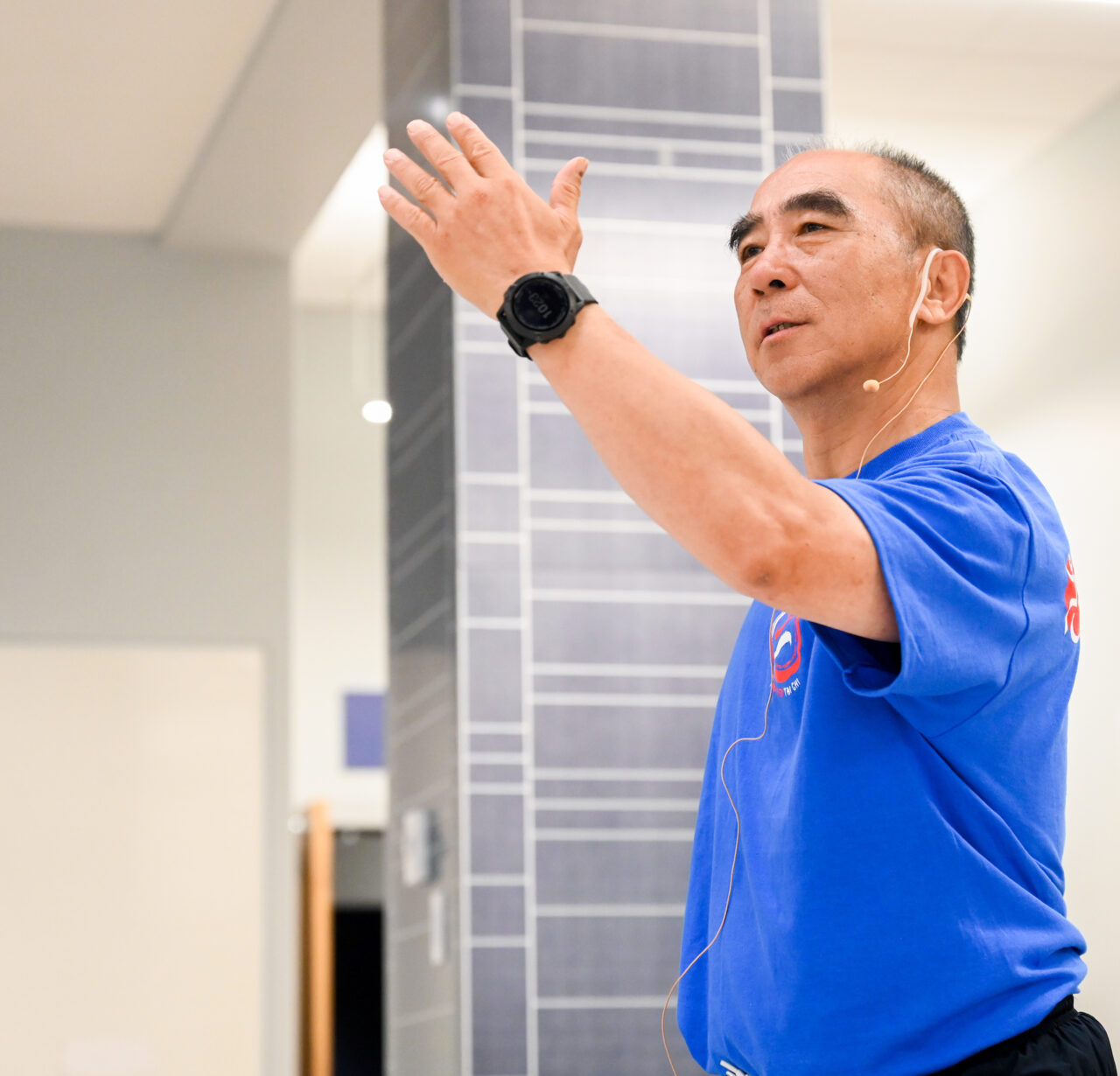 Zibin Guo and others participate in three-day Wheelchair Tai Chi for Veterans seminar Thursday, June 8, 2023 in Lupton Hall.